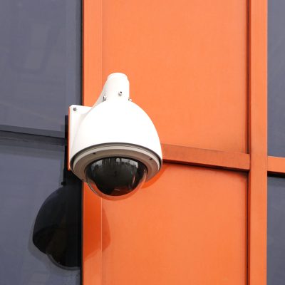 Outdoor video surveillance camera , dome security camera on the street.
